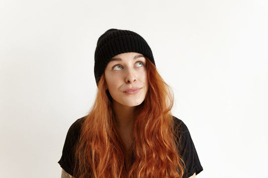 A girl wearing a blakc beanie