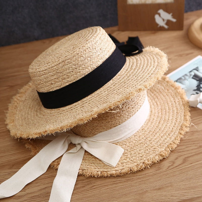 summer hat showing both black and white options