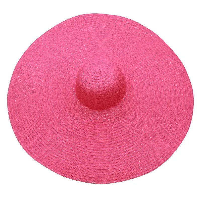 Large sun hat laying flat in pink