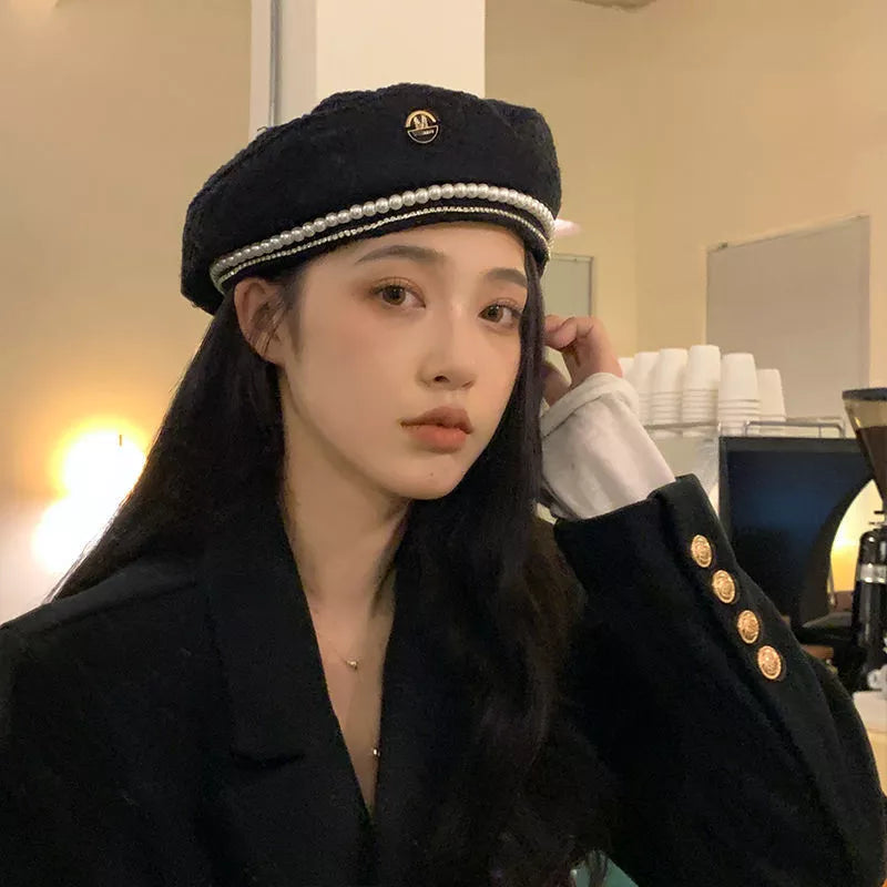 Beret with Pearls on model in black showing front biew 