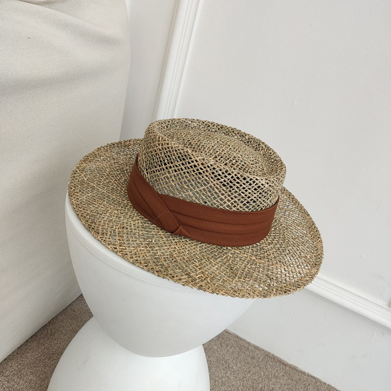 straw fedora hat showing red ribbon
