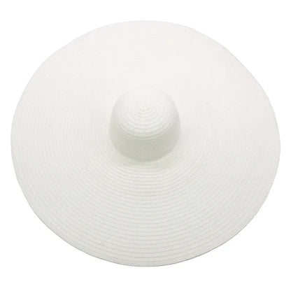 Large sun hat laying flat in white 