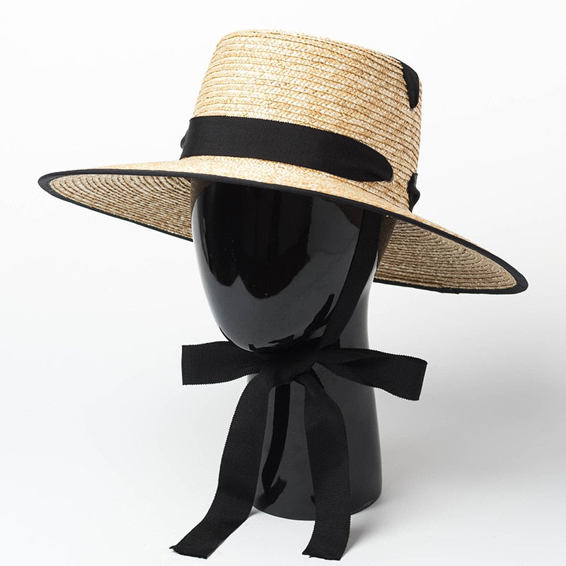 sun hat with tie showing hat tied on model