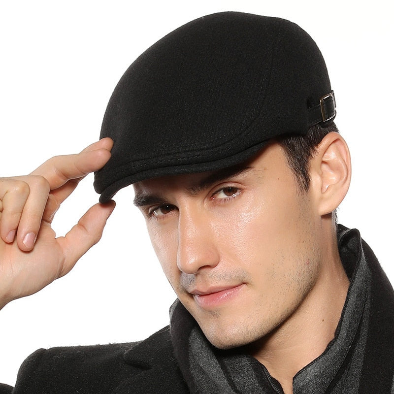 baker boy hat in black on model