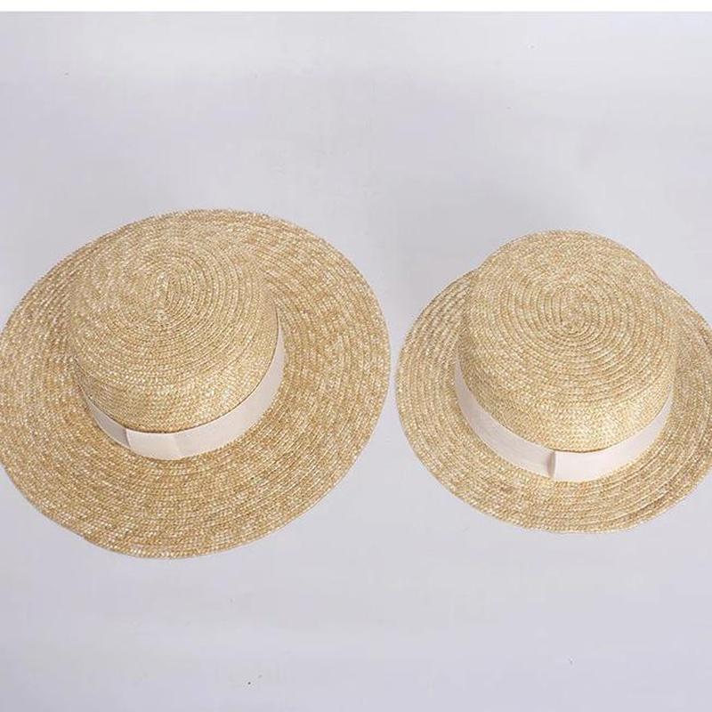 flat straw hat showing two hat sizes