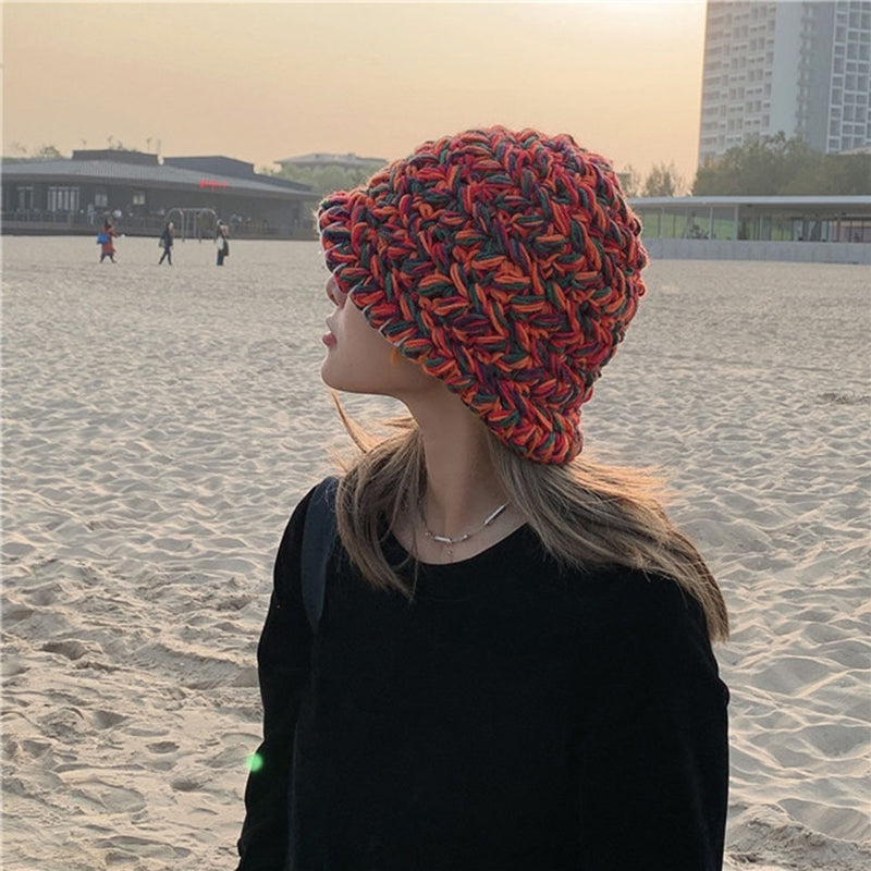 Knitted Bucket Hat on model on front of the ocean