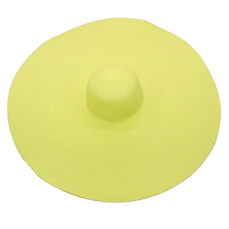 Large sun hat laying flat in green and yellow