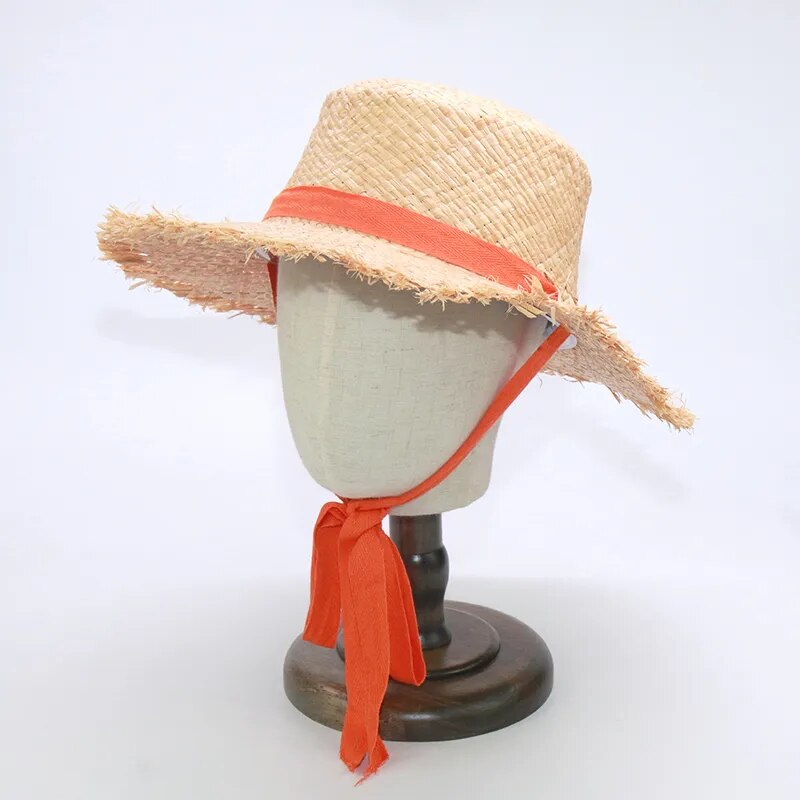 Mom and Daughter Matching Hats in orange on a stand