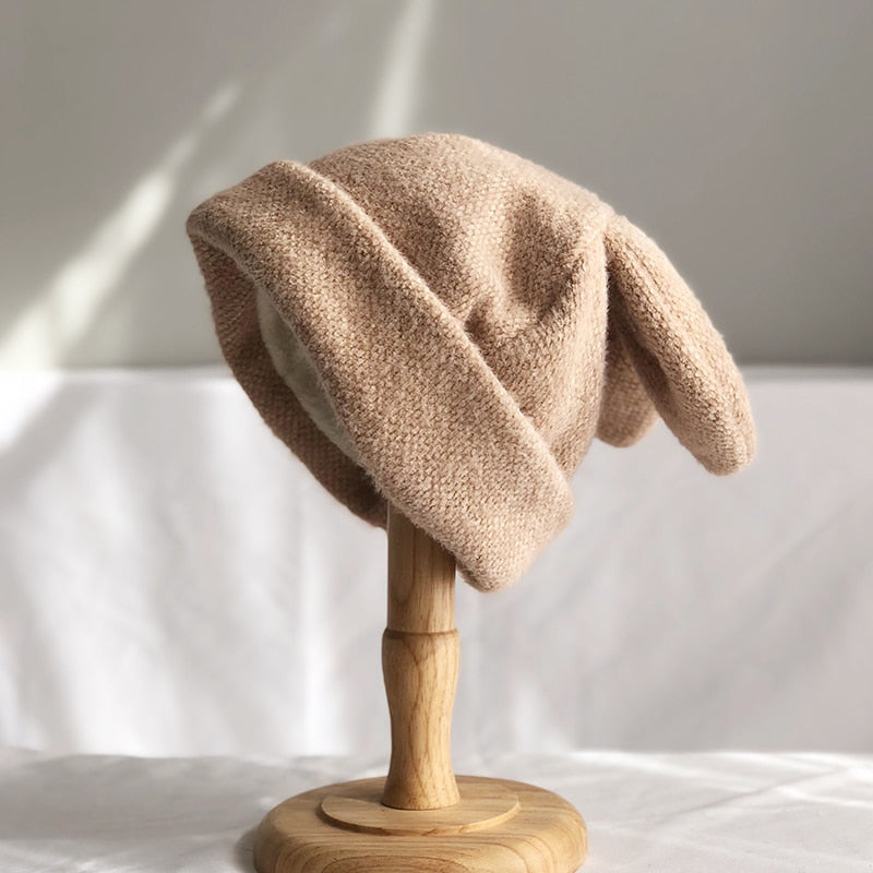 bunny ear beanie in light brown on stand