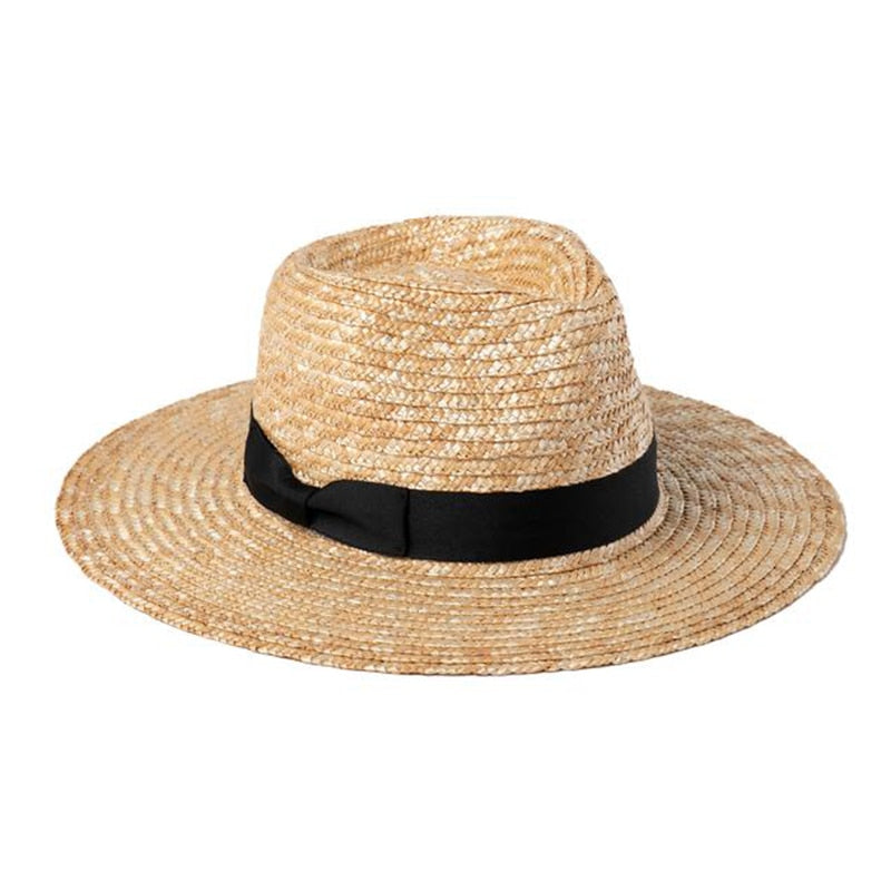 womens straw hat on white background side view 