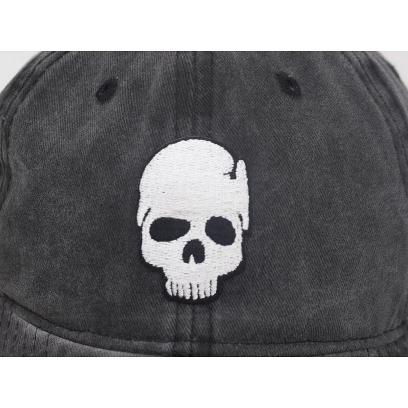 skull baseball cap showing closeup of skull logo