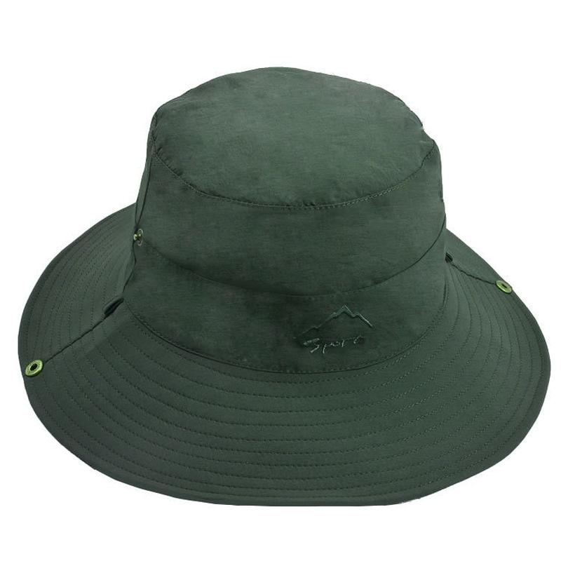 reversible bucket hat showing green solid color side