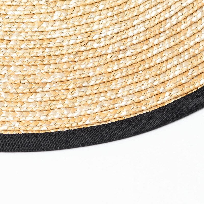 sun hat with tie showing closeup of straw