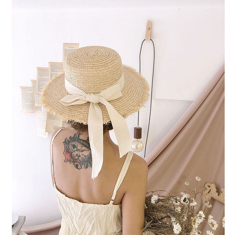summer hat on model showing back view from far away