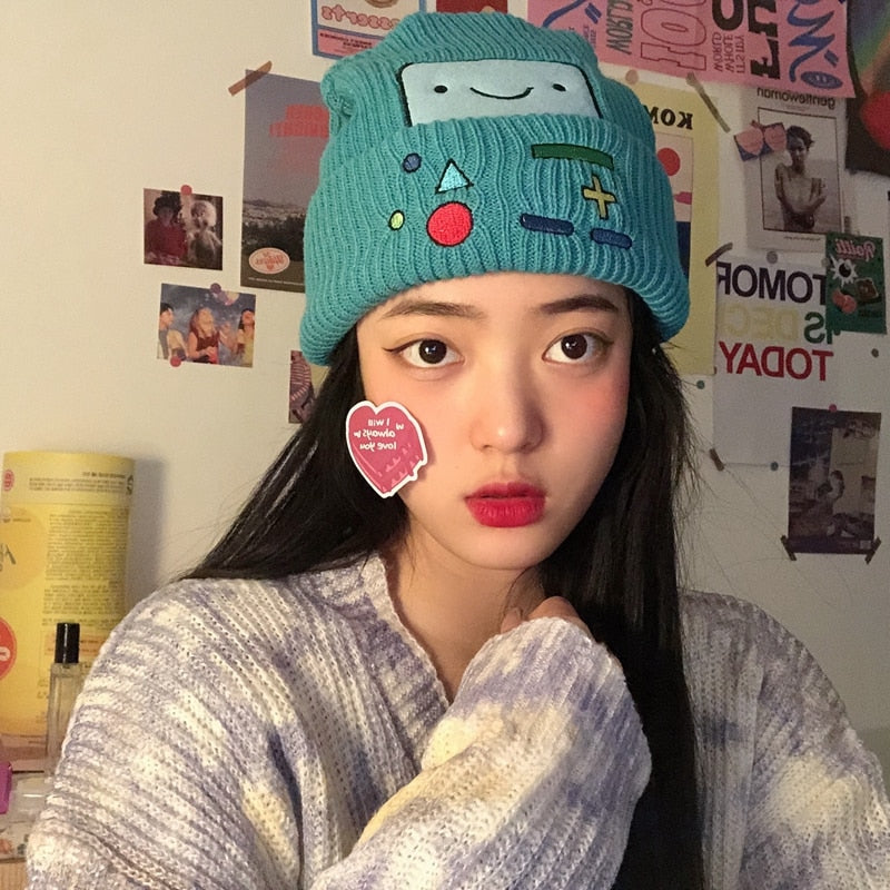 video game beanie on model in turquoise closeup