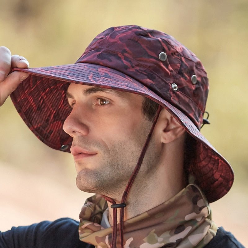 camo bucket hat on model in red