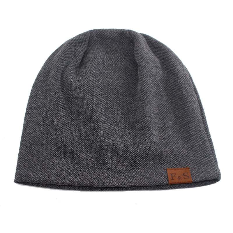 slouch beanie laying flat in gray