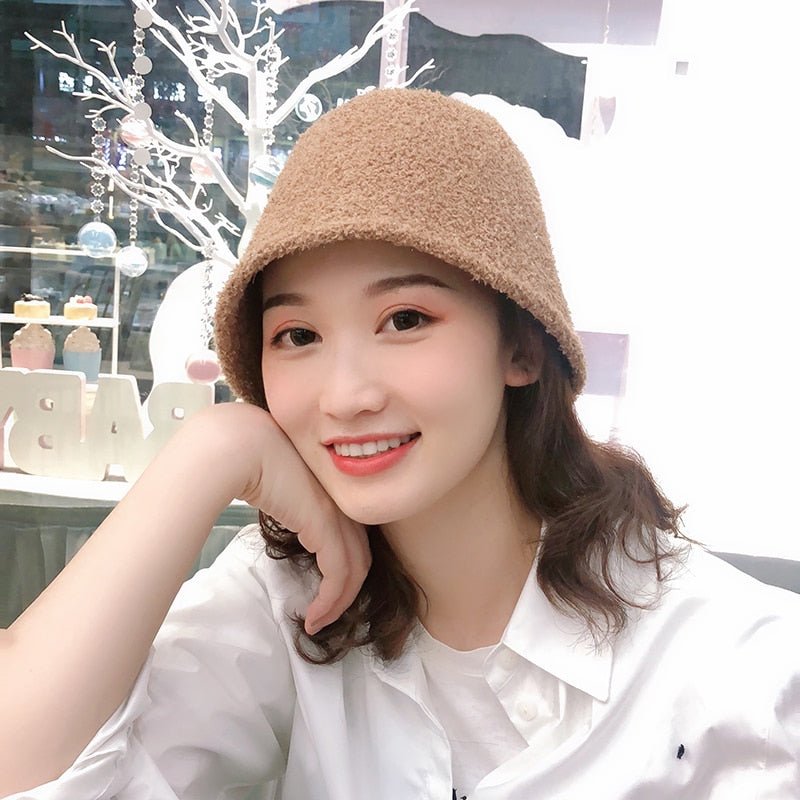 Fuzzy Bucket Hat on model in tan front view