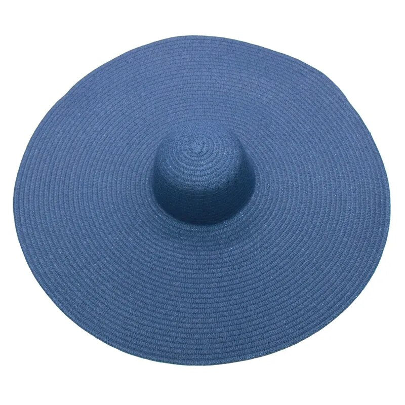 Large sun hat laying flat in dark blue