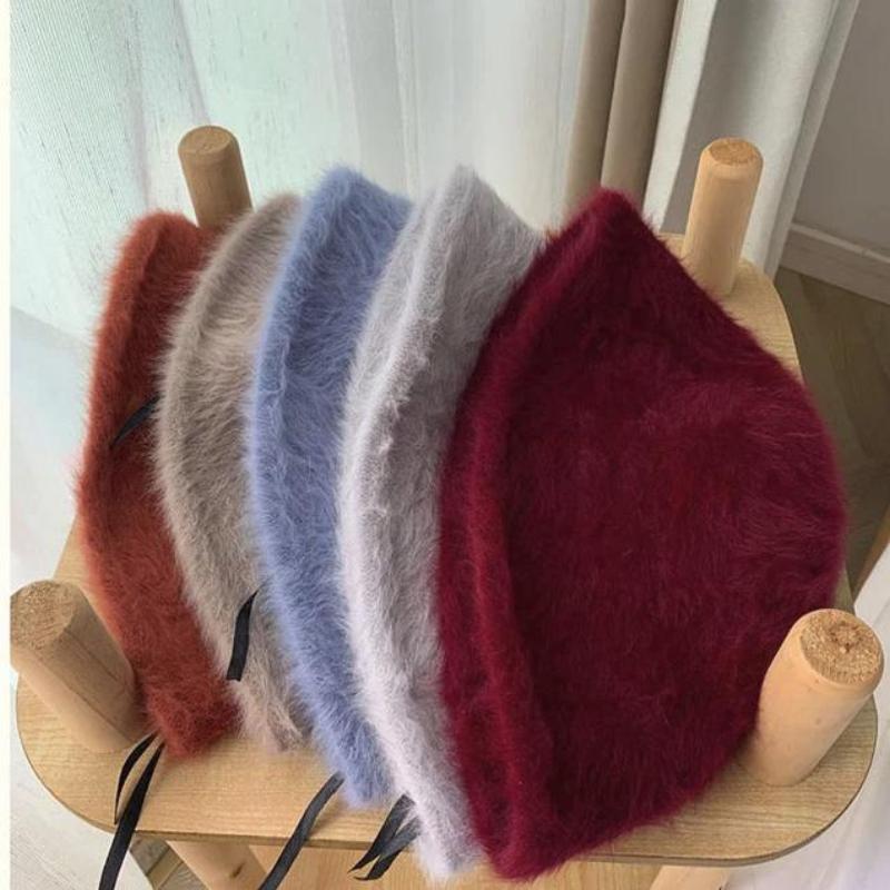fur bucket hat showing all color options