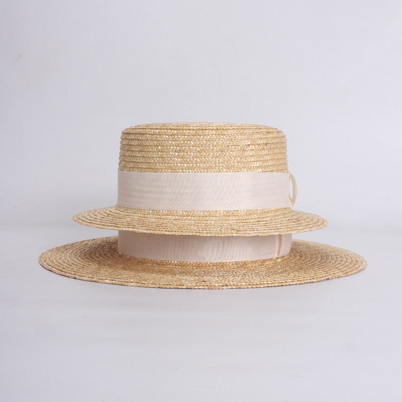 flat straw hat showing 2 hat sizes stacked on top of each other