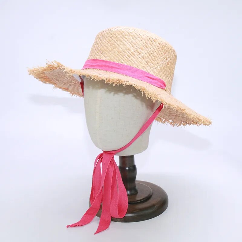 Mom and Daughter Matching Hats in bright pink on a stand
