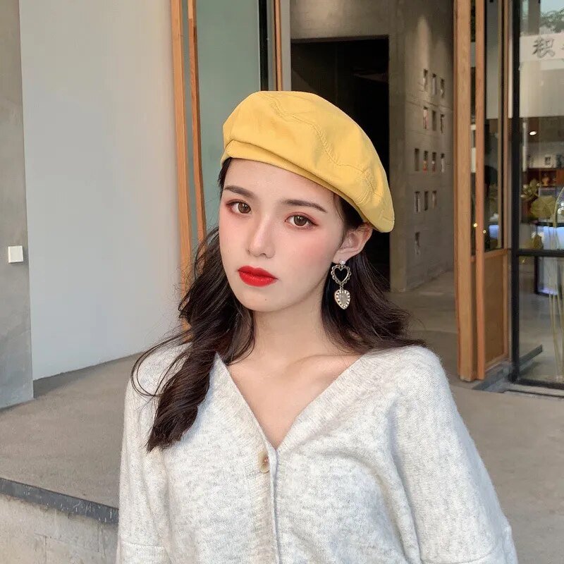 french barrette hat on model yellow