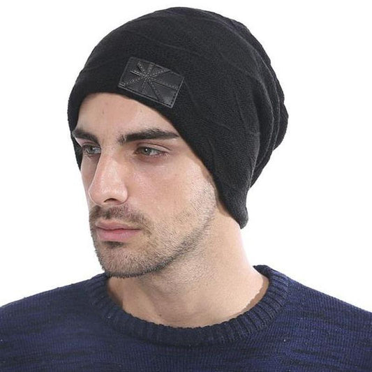 cable knit beanie on model in black
