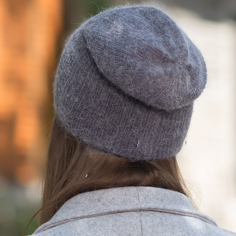soft beanie on model showing back of beanie in gray 