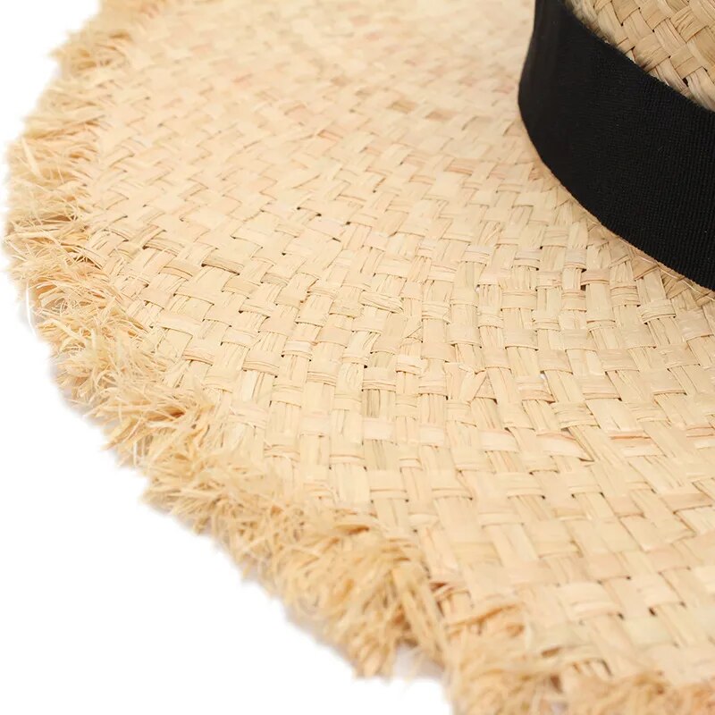 fringe straw hat closeup of frayed edges 