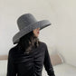 wide brimmed sun hat left side view on model