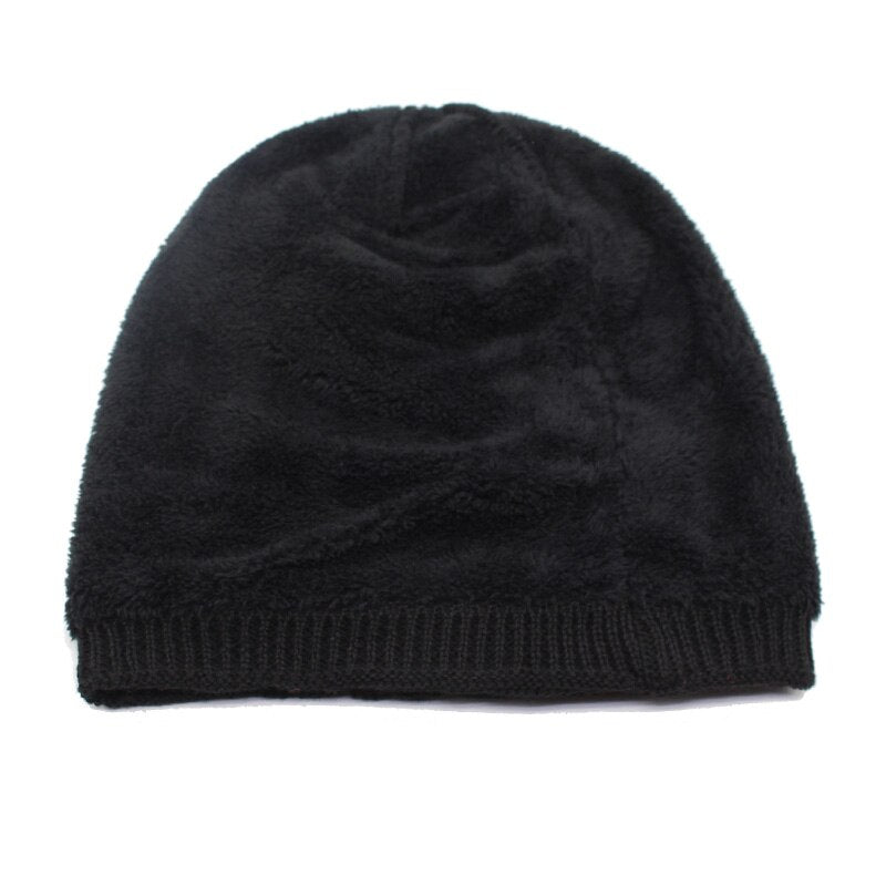cable knit beanie showing faux fur lined inside 