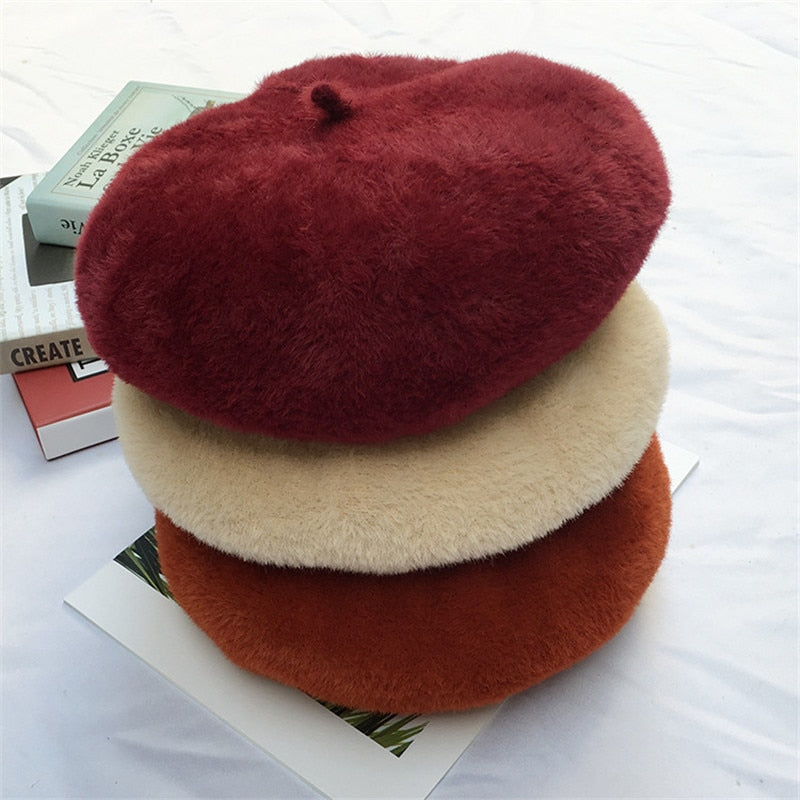 french beret showing 3 hats stacked up