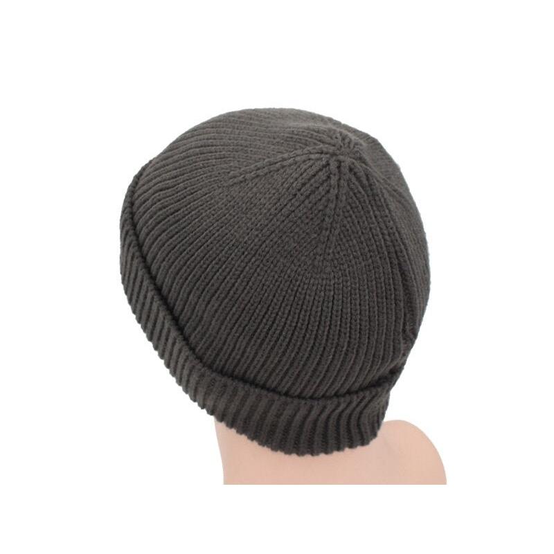 black ribbed beanie showing back of hat on stand 