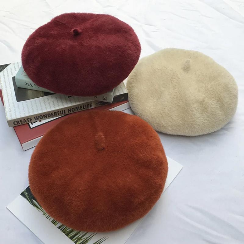 french beret showing three colors on table