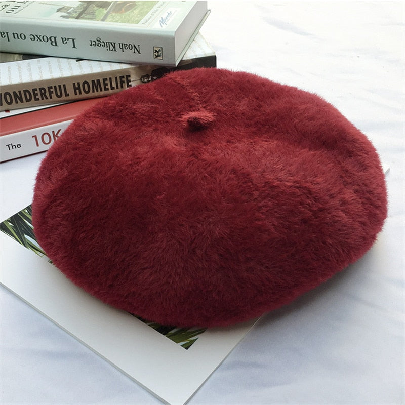 french beret on table in red