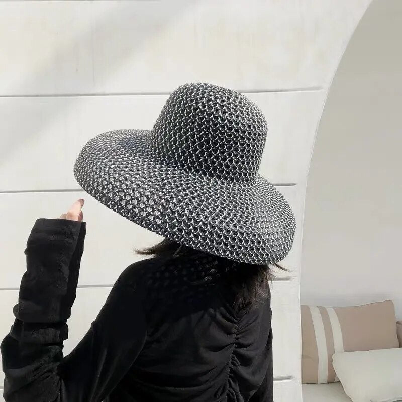 wide brimmed sun hat in gray on model back view 