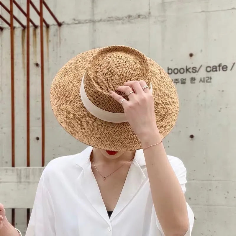 straw sun hat close up of hat on model