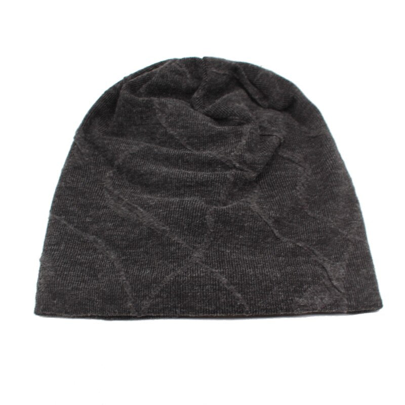 slouchy hat laying flat on white background 