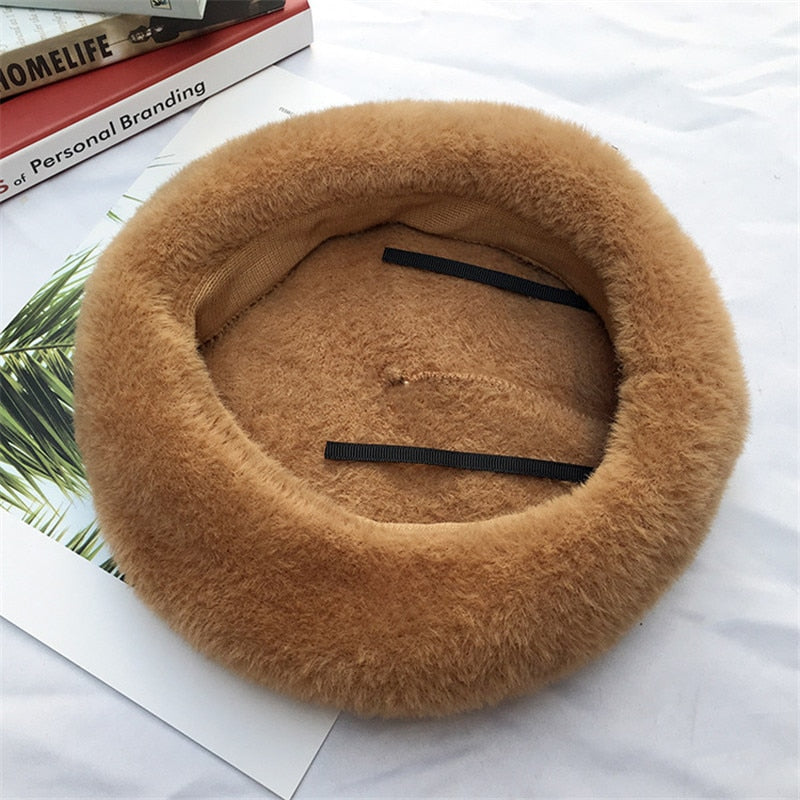 french beret showing inside of hat in brown from far away