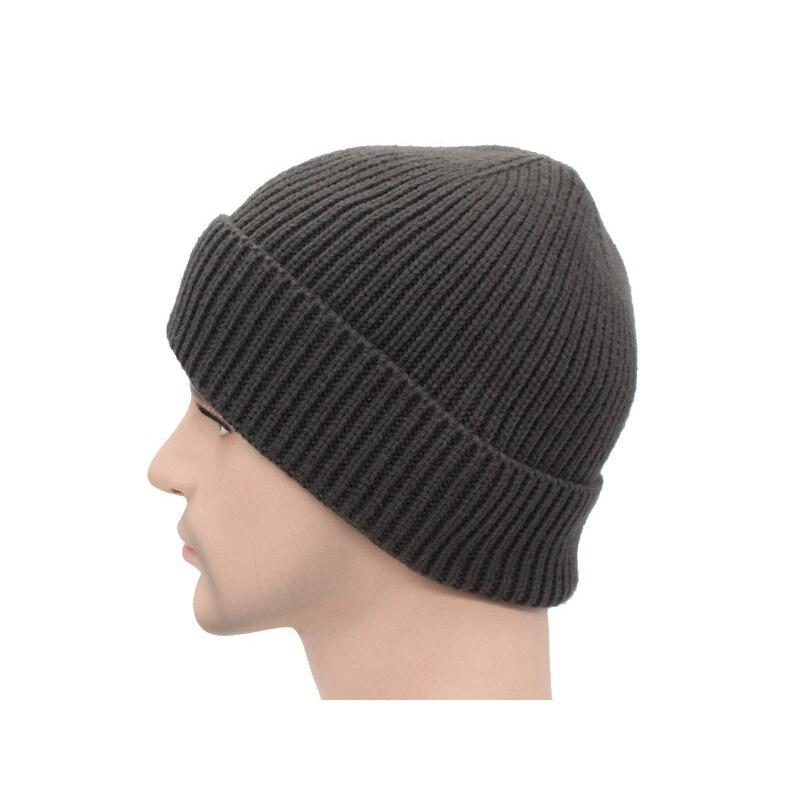 black ribbed beanie showing side view on stand 