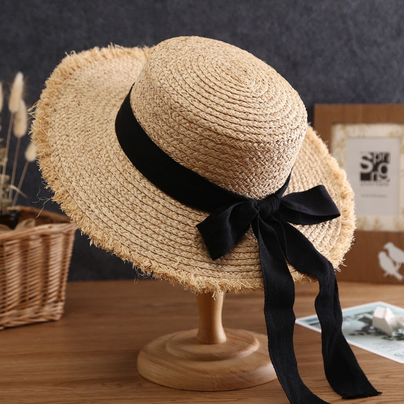 summer hat closeup of black verison on stand