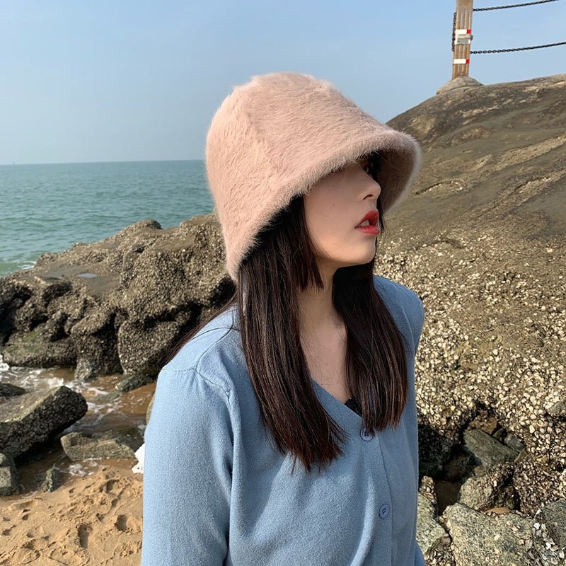 fur bucket hat on model in light brown