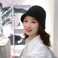 Fuzzy Bucket Hat on model in black front view