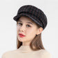 Cabbie Hat in black on model front view 