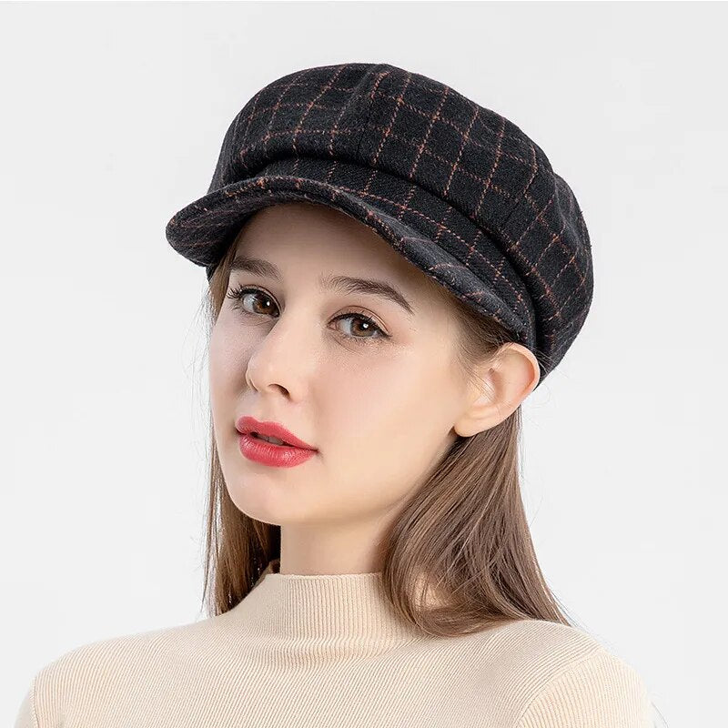 Cabbie Hat in black on model front view 