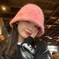 fur bucket hat on model in pink