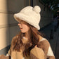 bear hat on model side view