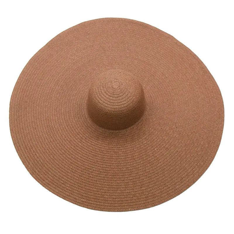 Large sun hat laying flat in brown