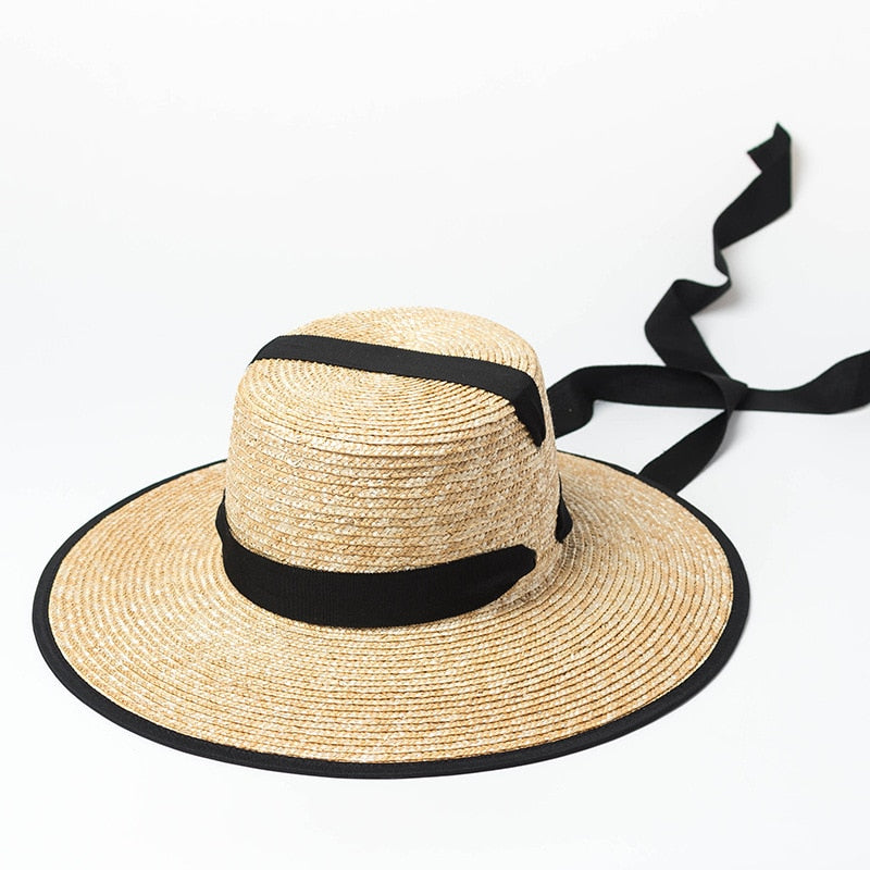 sun hat with tie with black ribbon